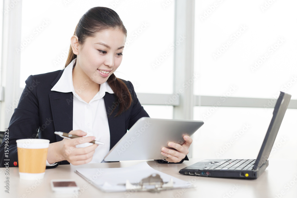 young asian businesswoman in modern office young asian businesswoman in modern office