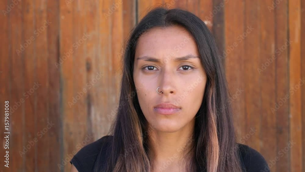 Beautiful Mixed-Race Woman Looking At Camera With Serious Face. Closeup. HD, 1920x1080. Beautiful Mixed-Race Woman Looking At Camera With Serious Face. Closeup. HD, 1920x1080.