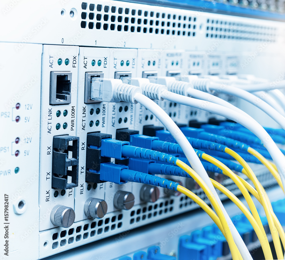 Fiber Optic Cables Connected To Optic Ports And UTP, Network Cables ...