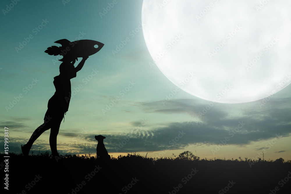 Silhouette dream of a child who wants fly to the moon, Concept child dream.