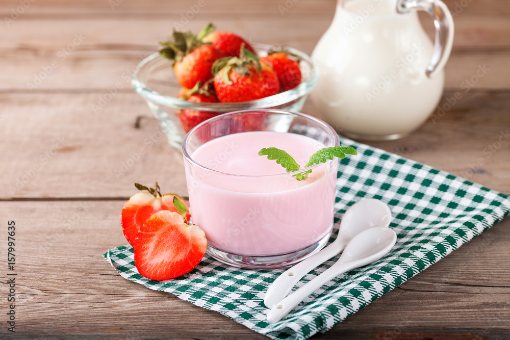 Strawberry yogurt and milk on a table. Selective focus. Copy space Strawberry yogurt and milk on a table. Selective focus. Copy space