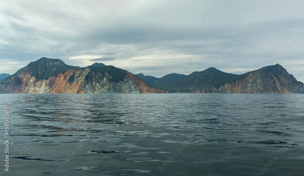 Rocks in Pacific Ocean. The coast of Kamchatka.