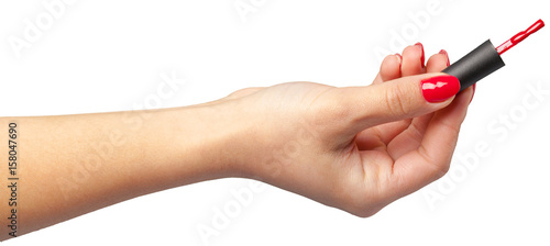 Female hand with nail polish isolated on white