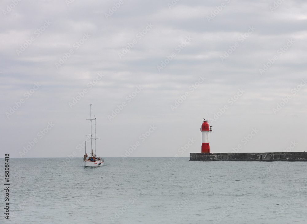 Red beacon at sea