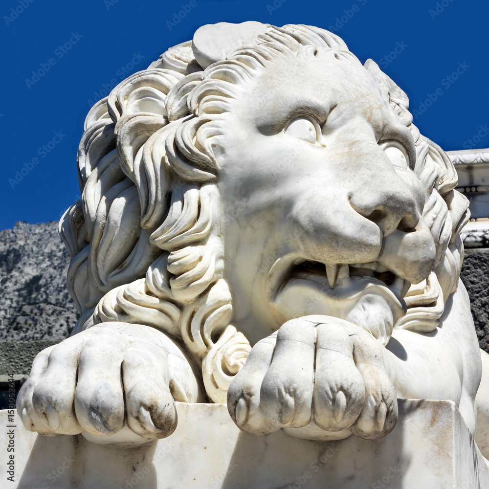 Marble sculpture of waking up lion in Vorontsov Palace in Alupka, Crimea, Russia.