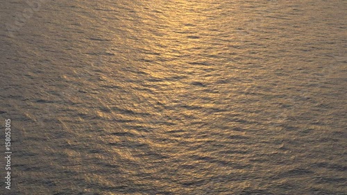 A beautiful sunrise sunset sea horizon golden hour photo