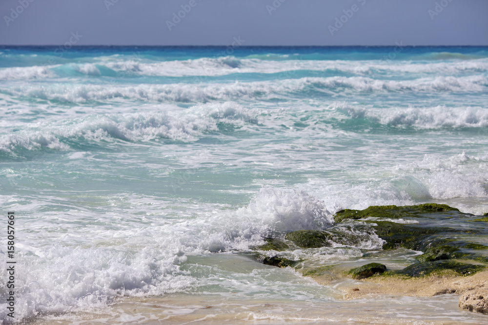 Seascape scenery on the shores of the Caribbean ocean. Sunny day with strong wind and waves. Seascape scenery on the shores of the Caribbean ocean. Sunny day with strong wind and waves.
