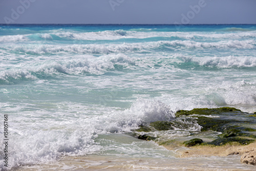Seascape scenery on the shores of the Caribbean ocean. Sunny day with strong wind and waves.