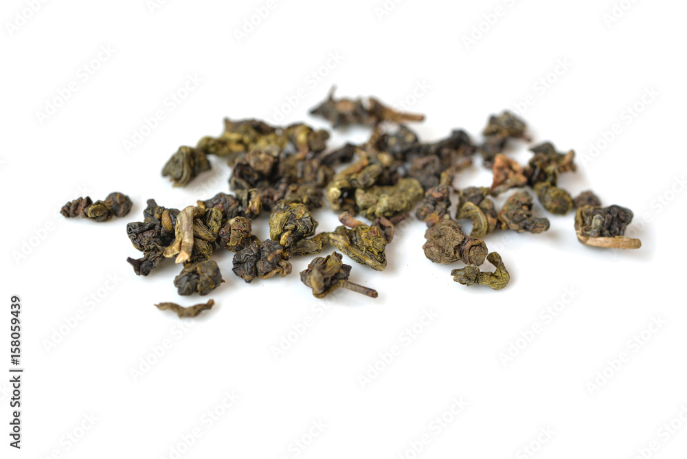 Oolong tea leaves on white background - isolated Oolong tea leaves on white background - isolated