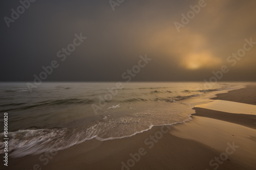 Foggy morning at the Baltic sea coast. Jastrzebia Gora, Poland photo