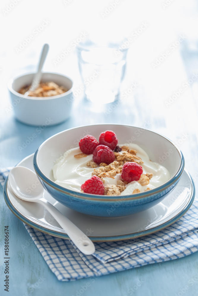 yogurt with granola and raspberry for healthy breakfast yogurt with granola and raspberry for healthy breakfast