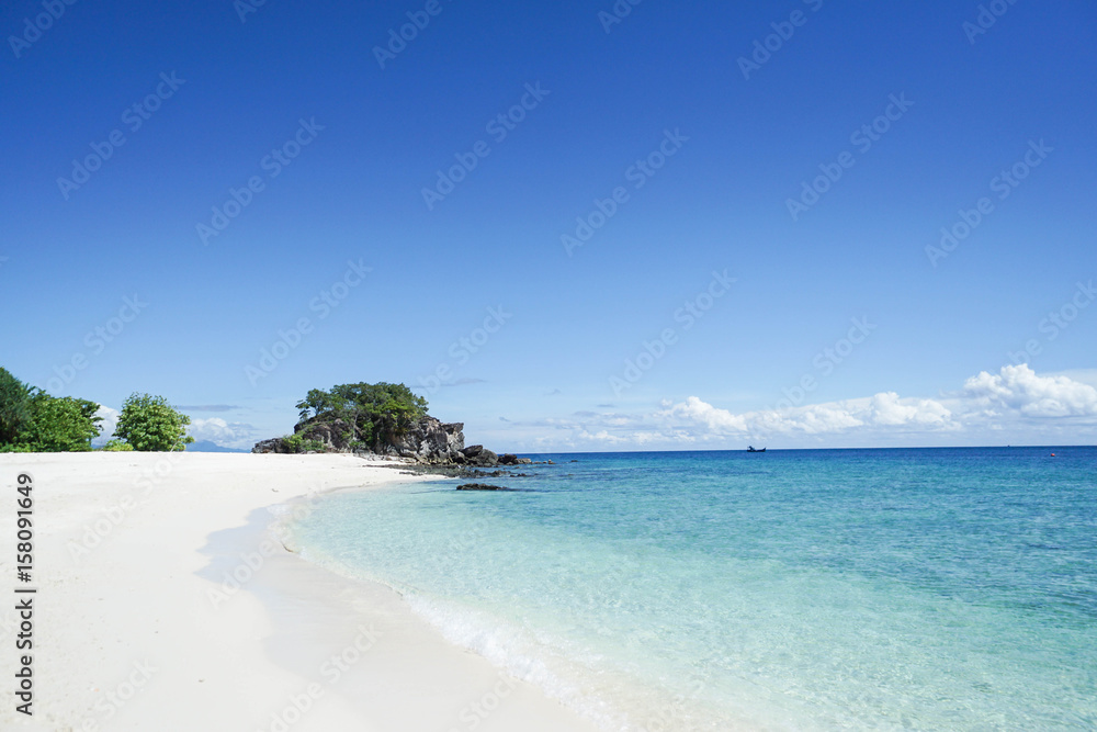 scenery of clear blue sea at beach in summer for relaxation