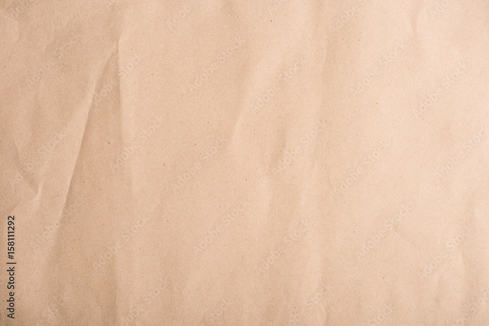 Close-up top view of old brown crumpled paper texture Close-up top view of old brown crumpled paper texture