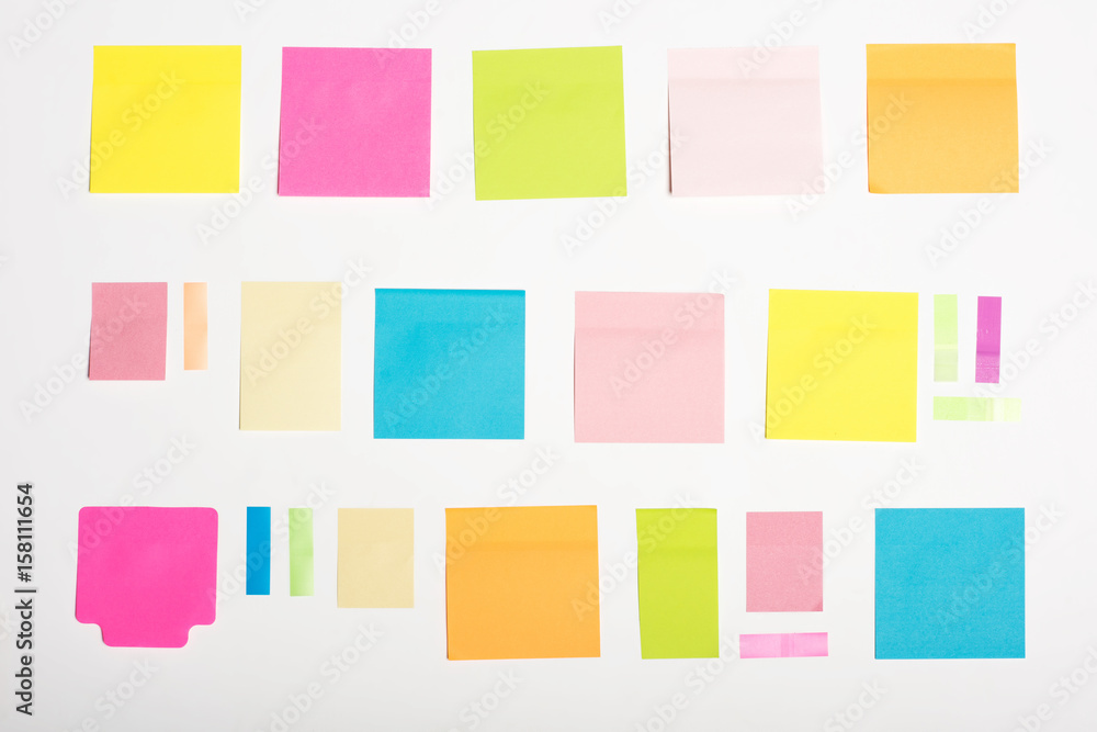top view of different empty colorful sticky notes isolated on white top view of different empty colorful sticky notes isolated on white