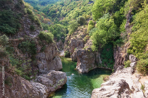 swimmers in the river Ardeche near the devil s bridge photo