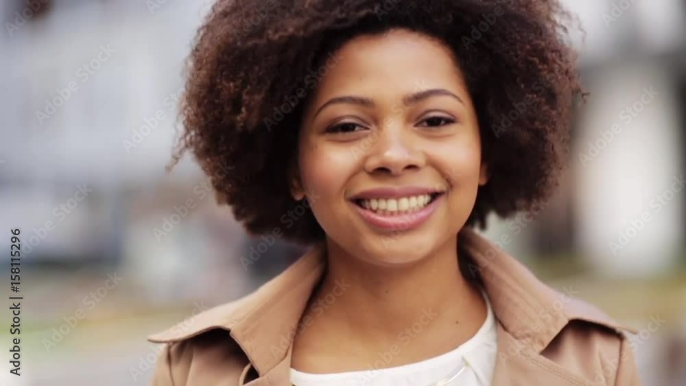 close up happy african american woman outdoors close up happy african american woman outdoors