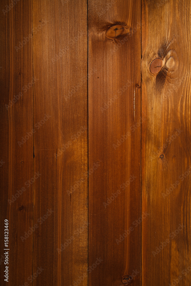 Maple-colored wooden background made of planks Maple-colored wooden background made of planks
