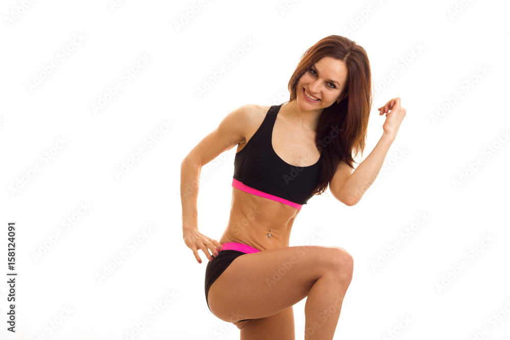 young fitness girl does exercise and smiling young fitness girl does exercise and smiling