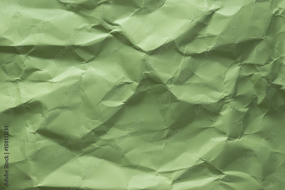 Background of colored crumpled paper shot close-up Background of colored crumpled paper shot close-up