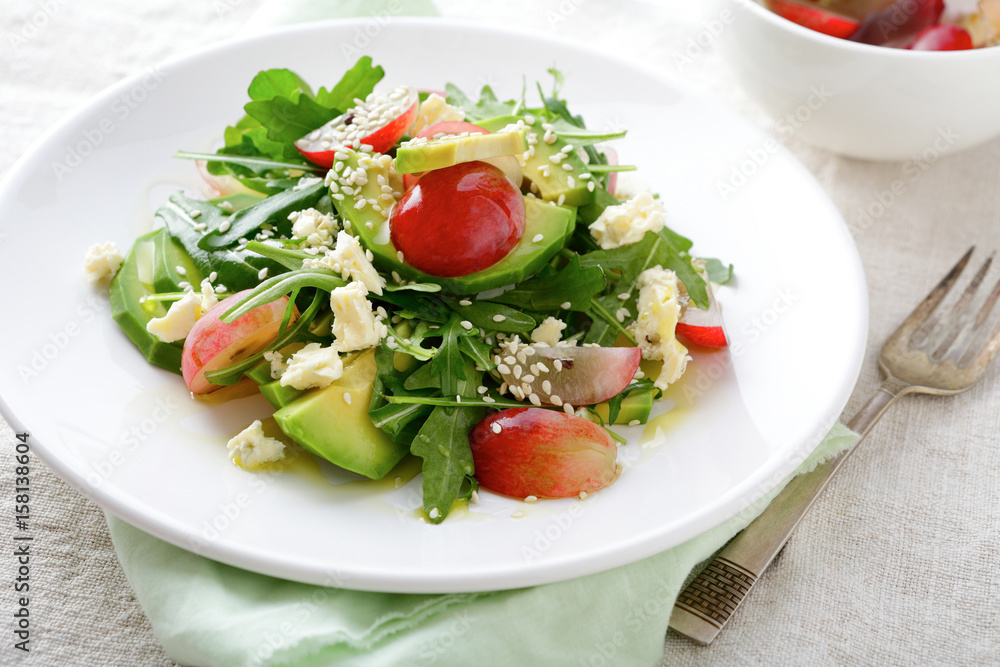 Avocado Salad with grape, arugula, blu cheese and sesame Avocado Salad with grape, arugula, blu cheese and sesame