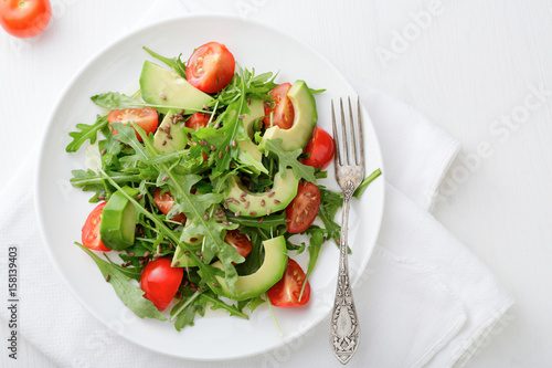 Green Avocado Salad with tomatoes and arugula