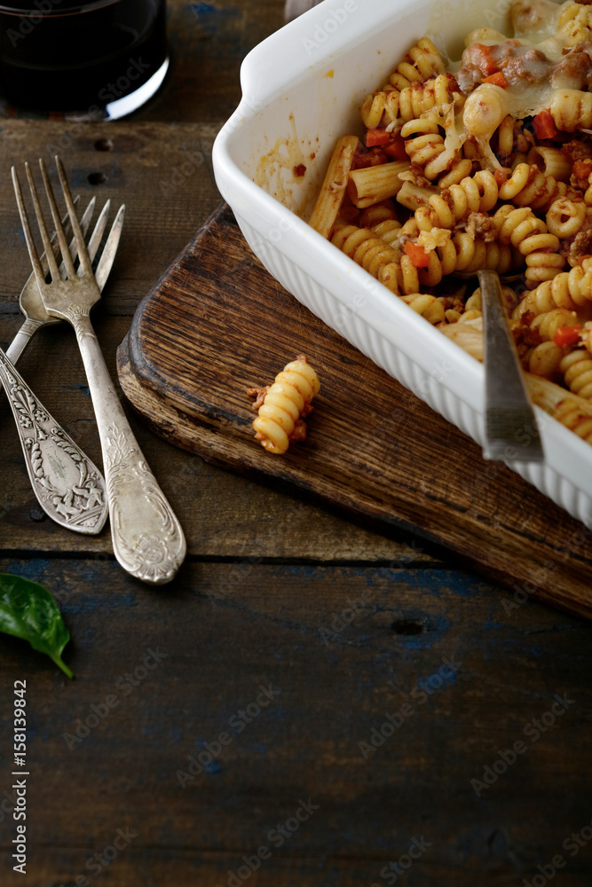 Pasta with a bolognese beef sauce in baking dish Pasta with a bolognese beef sauce in baking dish