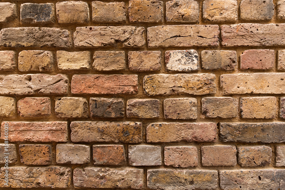 Pared de ladrillo de edificio antiguo. Pared de ladrillo de edificio antiguo.