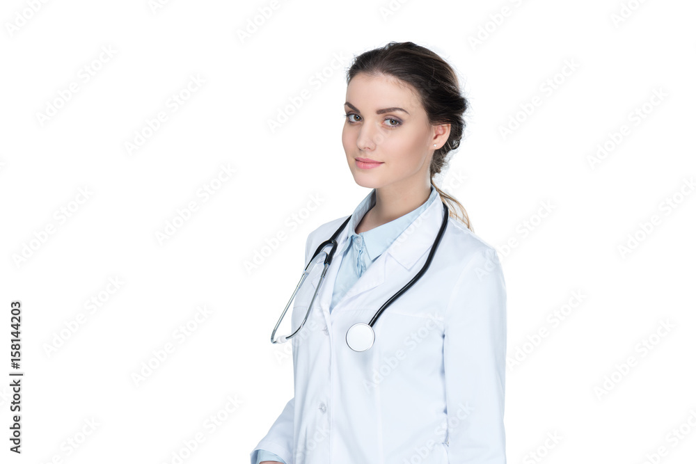 young general practitioner with stethoscope looking at camera isolated on white young general practitioner with stethoscope looking at camera isolated on white