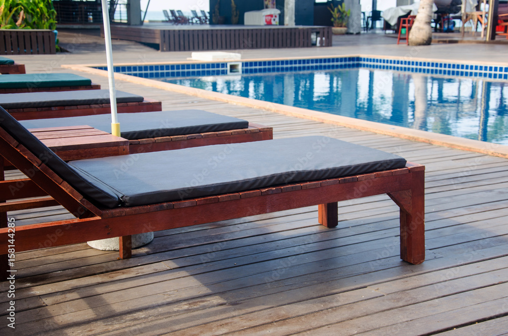 Fototapeta premium Chairs swimming pool