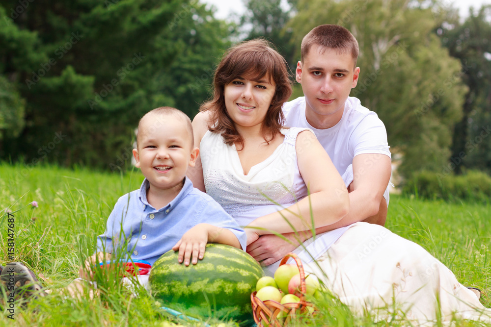 Love smiling family having picnic in summer park Love smiling family having picnic in summer park