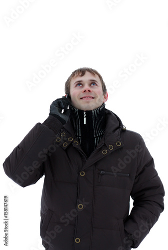 A young man talking on the phone