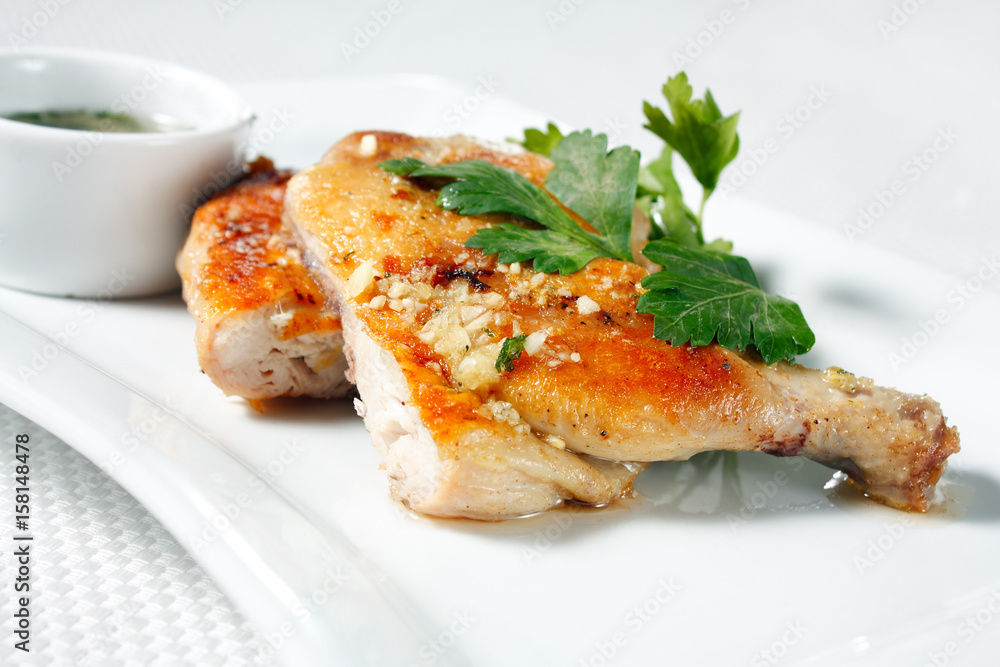 Roasted chicken legs with garlic sauce