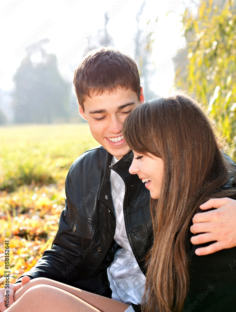 Happy smiling couple in love having fun autumn sunny day Happy smiling couple in love having fun autumn sunny day