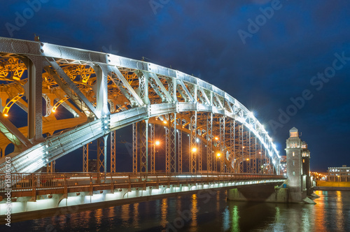 Bolsheokhtinsky Bridge (Peter the Great Bridge) a summer night in Saint Petersburg photo