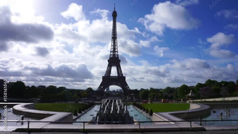 Video of Eiffel Tower as seen from distance on a spring morning with beautiful clouds, Paris, France Video of Eiffel Tower as seen from distance on a spring morning with beautiful clouds, Paris, France