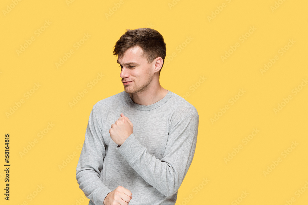 The young man with a raised fist The young man with a raised fist