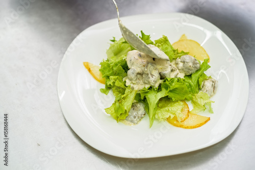 Vegetable salad with liver in cream photo