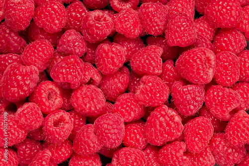 Fresh and sweet raspberries background