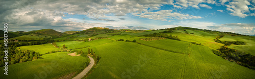 Beautiful panorama landscape of waves hills in rural nature, Tuscany farmland, Italy, Europe