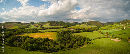 Beautiful Aerial landscape of waves hills in rural nature, Tuscany farmland, Italy, Europe