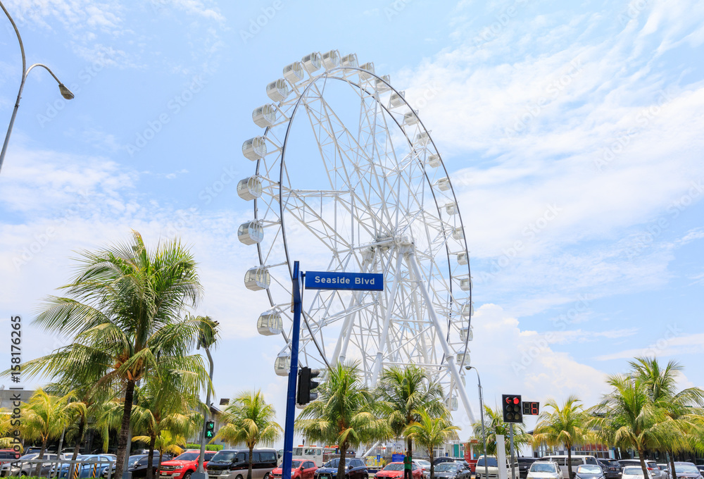 May 31, 2017 Ferris wheel at Mall of Asia in Manila. The ferris wheel is situated near Manila Bay and is a popular attraction in the area