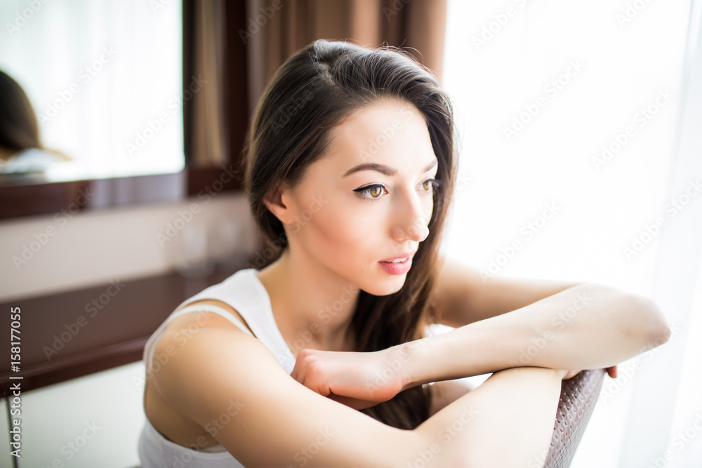 Relaxing woman sitting comfortable in chair smiling happy looking at camera. Relaxing woman sitting comfortable in chair smiling happy looking at camera.