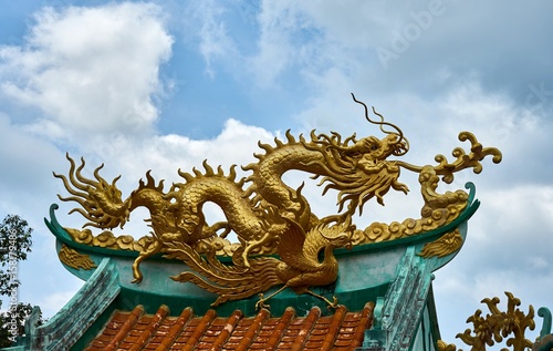 Gold dragon on a canopy. Chinese Temple © Viacheslav