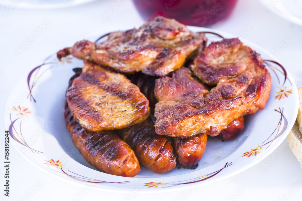 Grilled meat with bread and seasonings Grilled meat with bread and seasonings