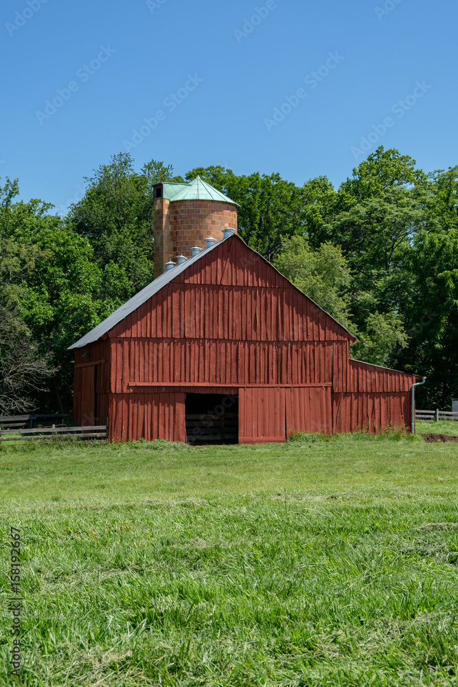 Pasture and barn with silo - portrait Pasture and barn with silo - portrait