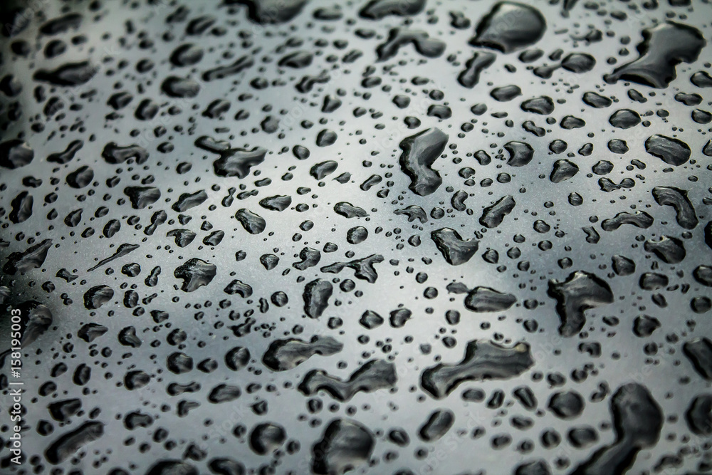 Water droplets on a dusty machine Water droplets on a dusty machine