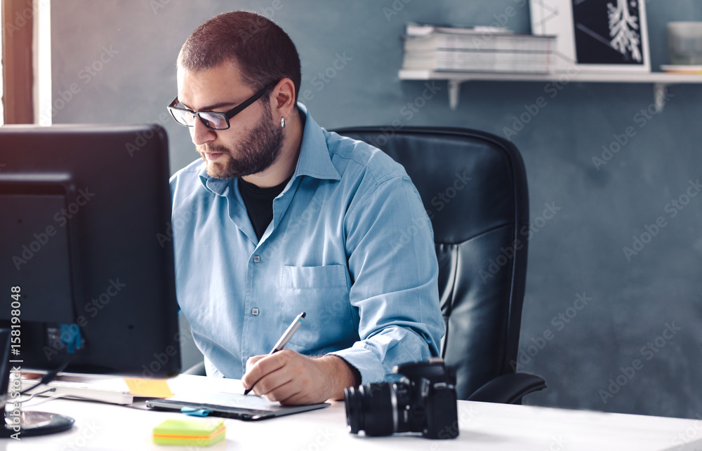 Illustrator At Work/ Young businessman at office.Illustrator At Work/ Young businessman at office. Illustrator At Work/ Young businessman at office.Illustrator At Work/ Young businessman at office.