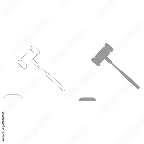 The judicial hammer  the grey color icon .