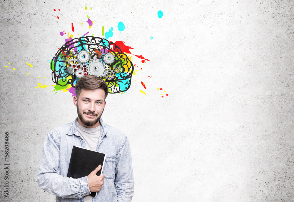 Skeptical young businessman and brain with cogs Skeptical young businessman and brain with cogs