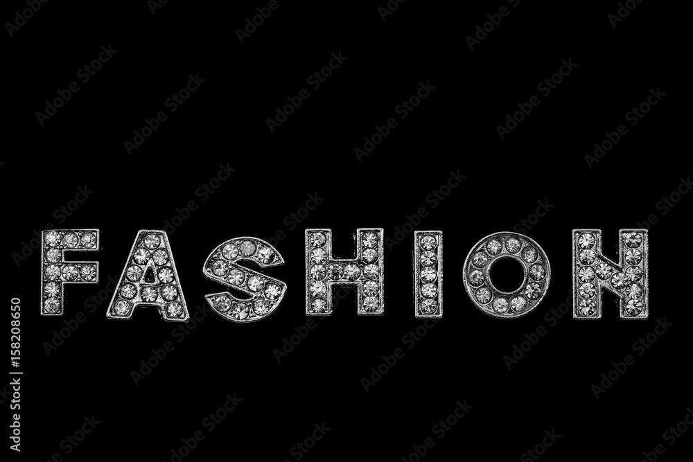 Obraz premium FASHION / FASHION. View of alphabet jewel on black background.